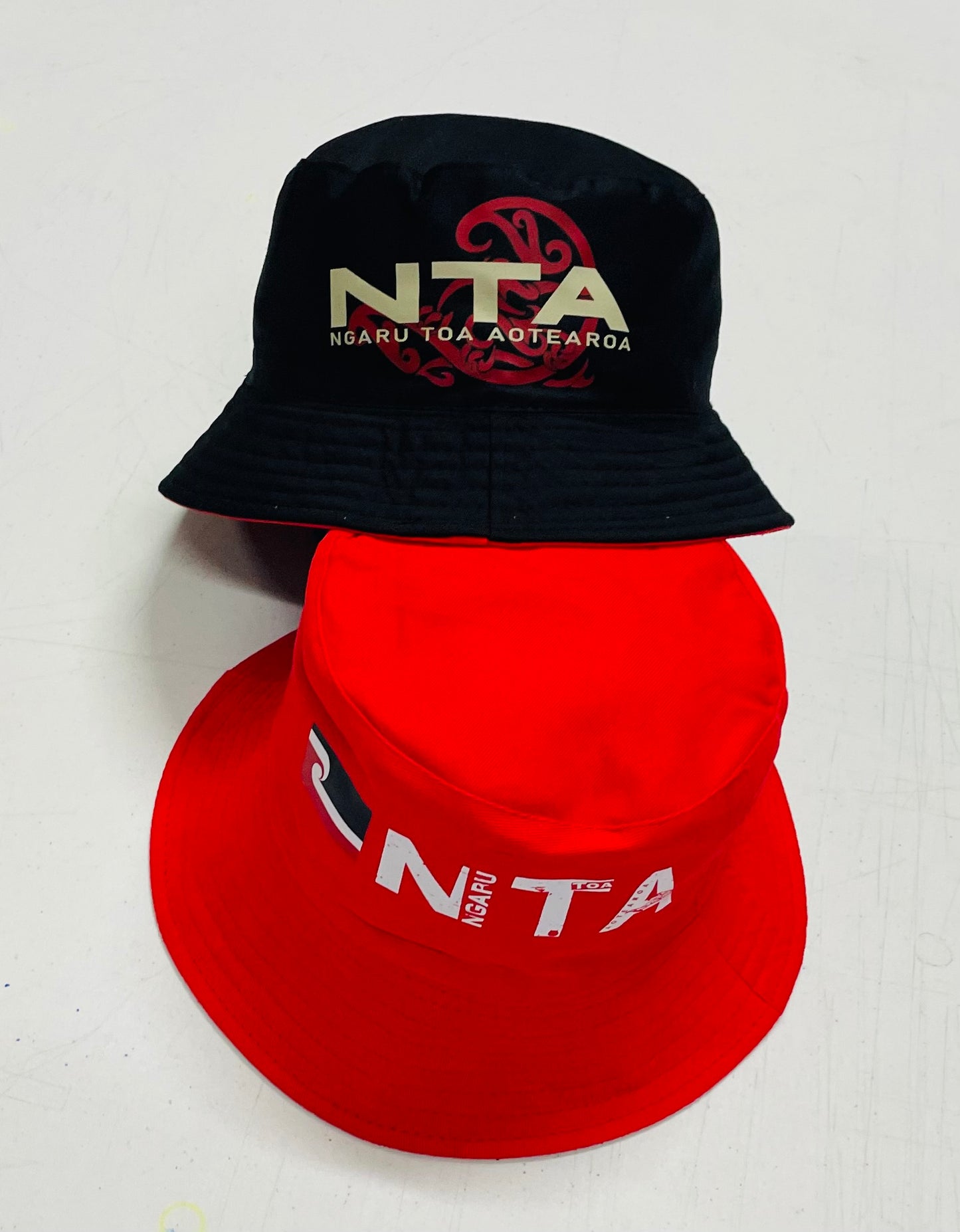 NTA 'Reborn' Reversible Bucket Hat